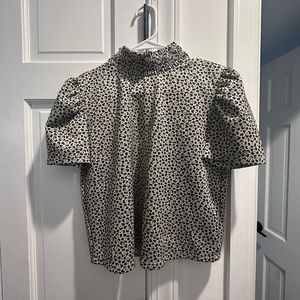 Zara collared top - It’s smart and fashionable. Fits a bit small. It looks new!